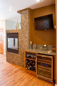 3 sides fireplace with wine cooler in Loveland Colorado